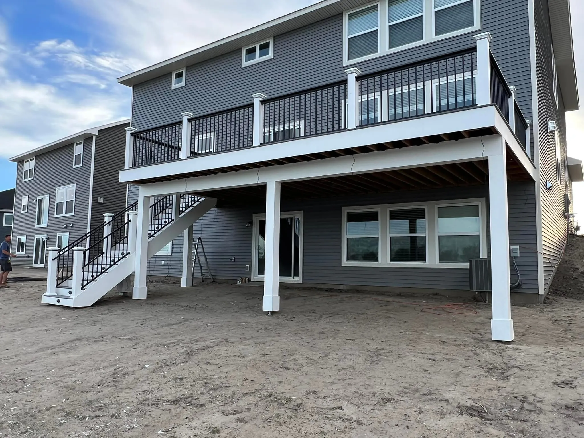 Front view of a beautiful house and have deck framing