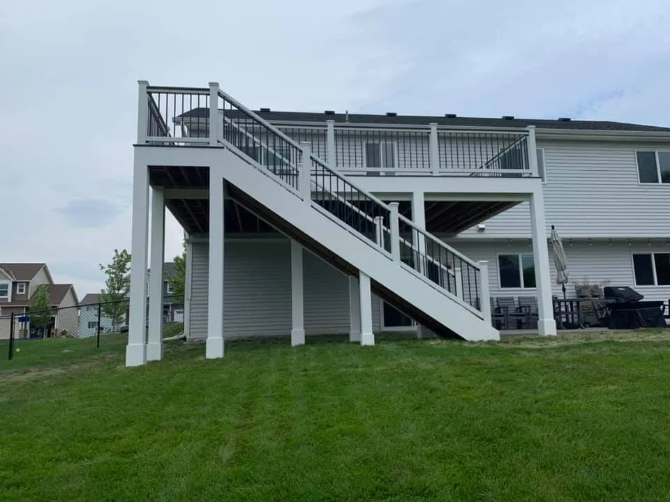 Long white stairs and deck framing